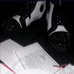 Christian louboutins come with box bags and authenticity tag white with black ;)